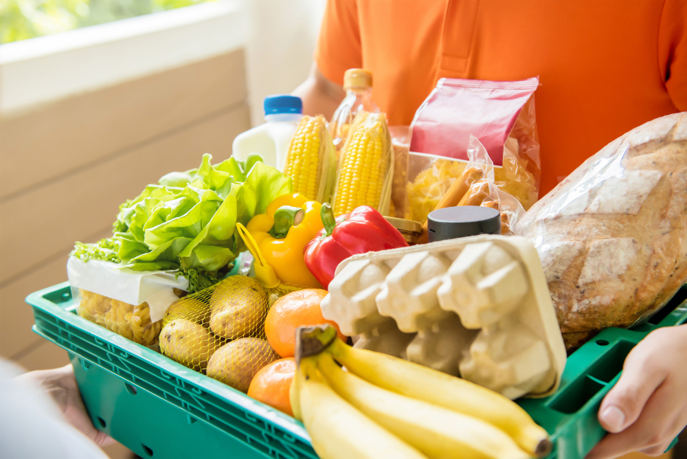 grocery-store-delivery-man-delivering-food-customer-home